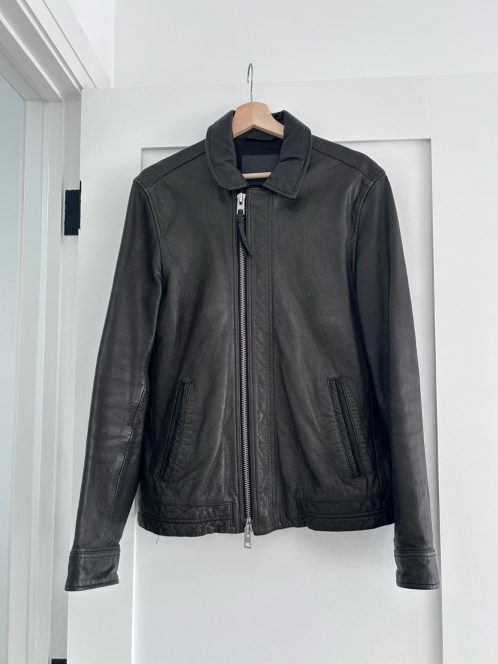 All Saints men’s minimalist black leather bomber jacket